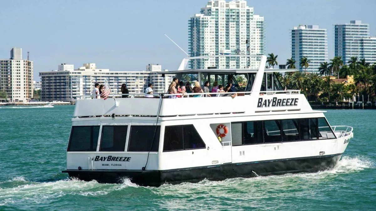 Biscayne Bay cruise passing Miami skyline and waterfront mansions on a Miami cruise before a Bahamas cruise from Miami