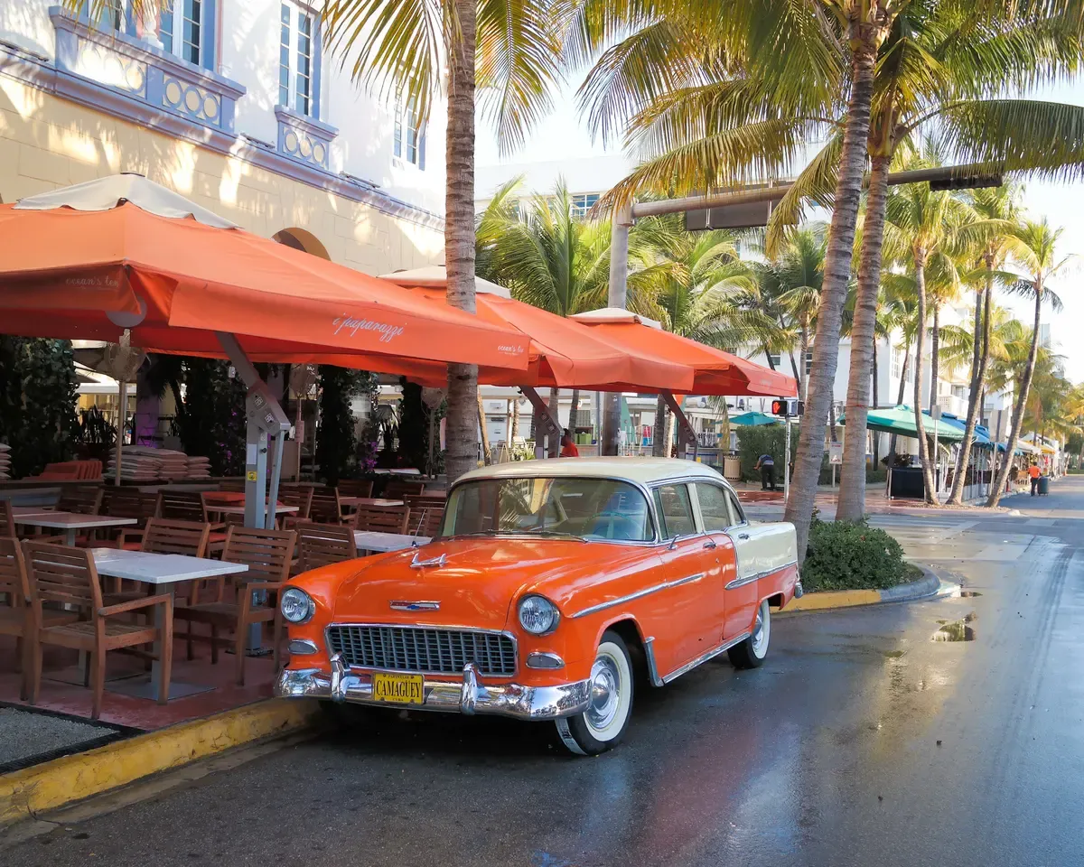 A 1955 Bel Air outside the Edison Hotel on Ocean Drive in the Art Deco District, free to walk before a Bahamas cruise from Miami