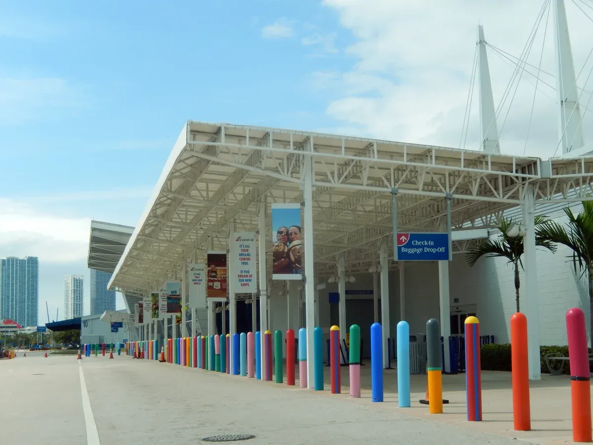 The baggage drop-off canopy at a PortMiami cruise terminal, where a Bahamas cruise from Miami begins
